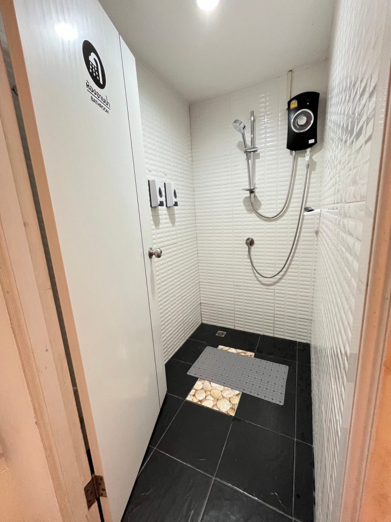 A clean and modern hostel shower on Koh Samet