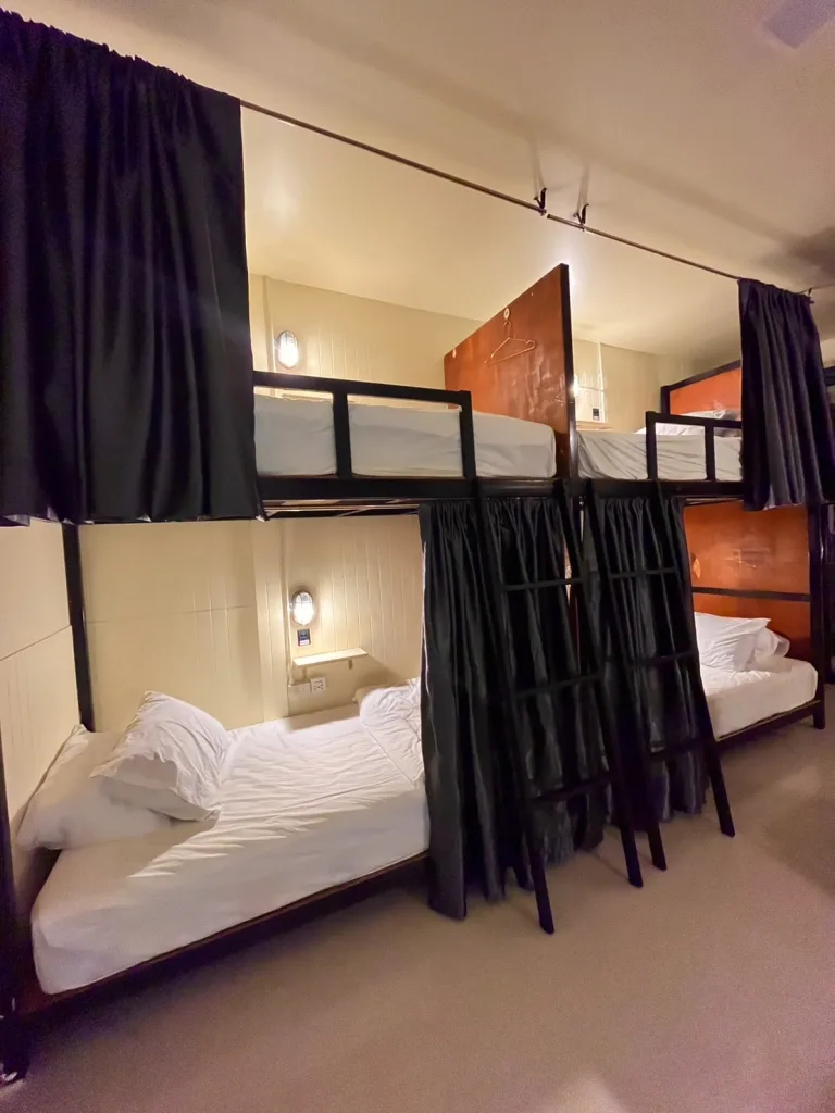 Left side bunks in the bedroom of The Cocoon Hostel - Koh Samet