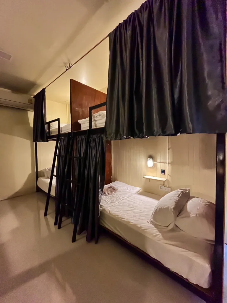 Bunks in the bedroom of The Cocoon Hostel - Koh Samet