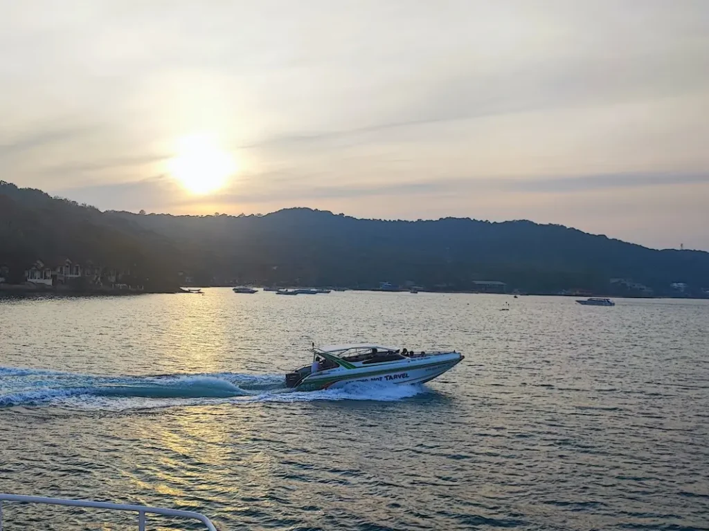 Speed boat at sunset Speed boat at sunset