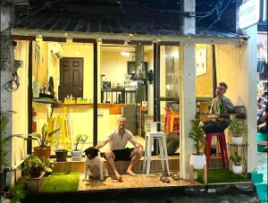 Nick and Jake sat outside The Cocoon Hostel