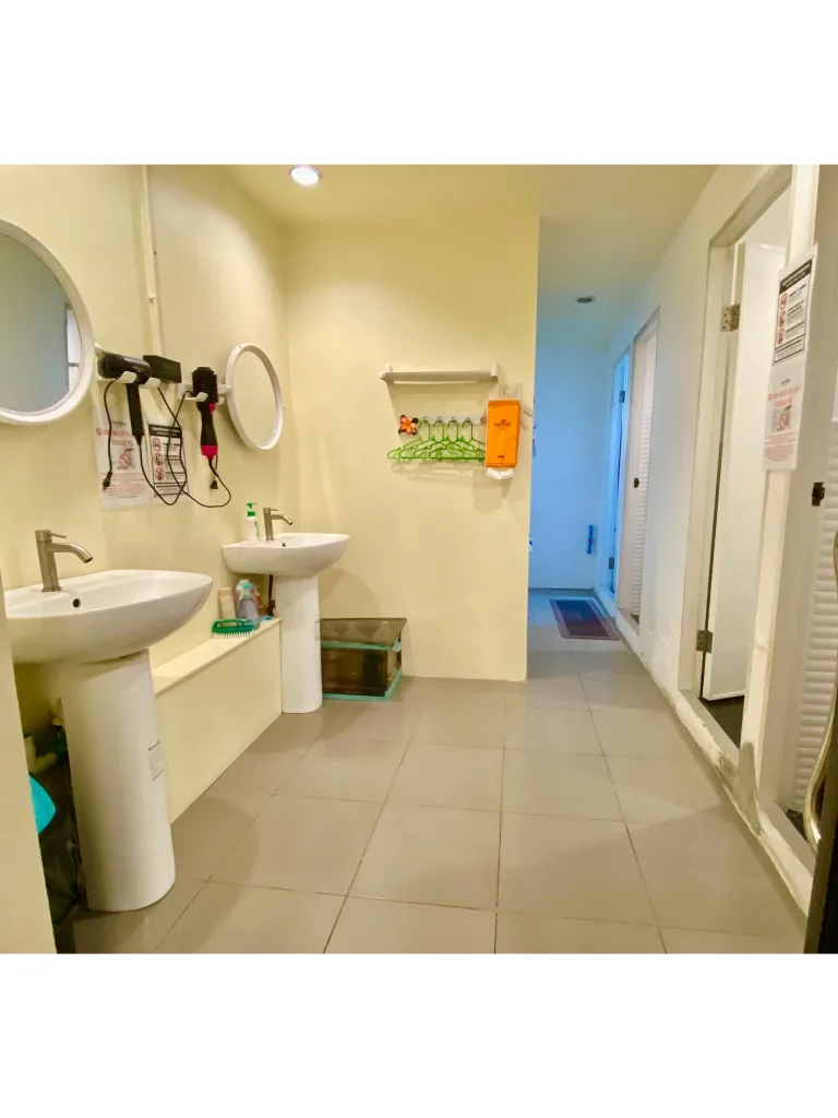 Clean shared bathroom facilities at the best value hostel in Koh Samet.