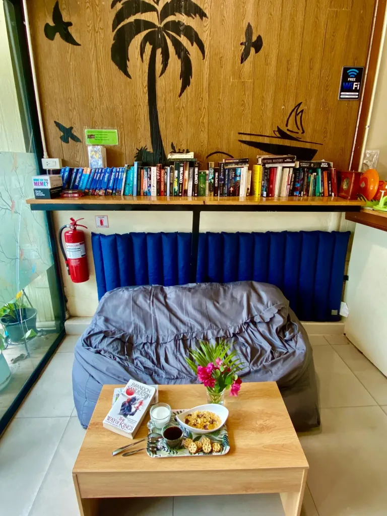 Front room and library at the cocoon Hostel